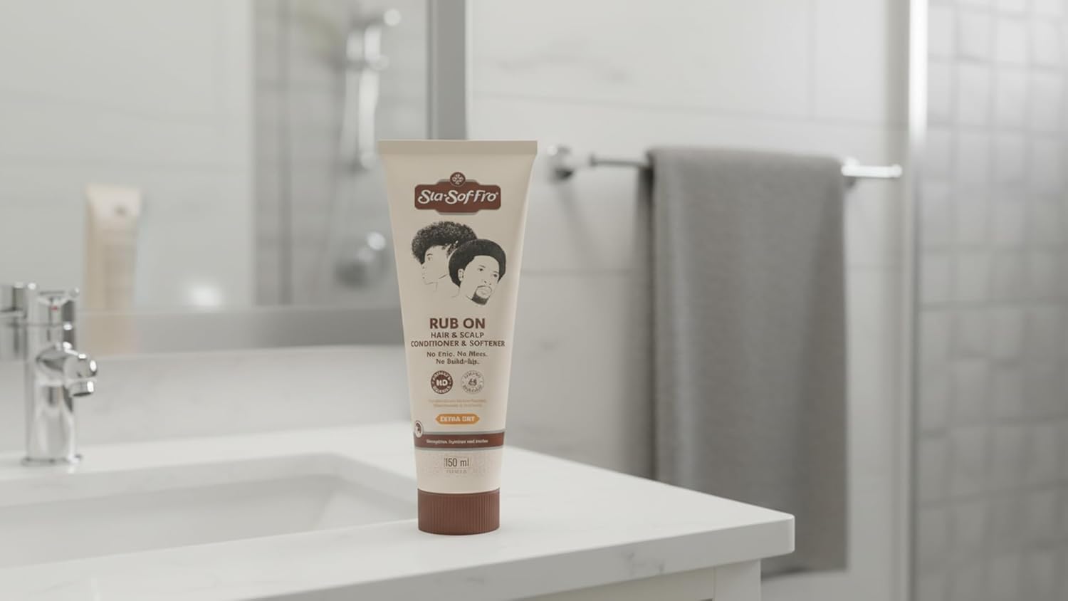 Sta-Sof-Fro being rubbed into scalp of braided hair to soothe dryness and add moisture