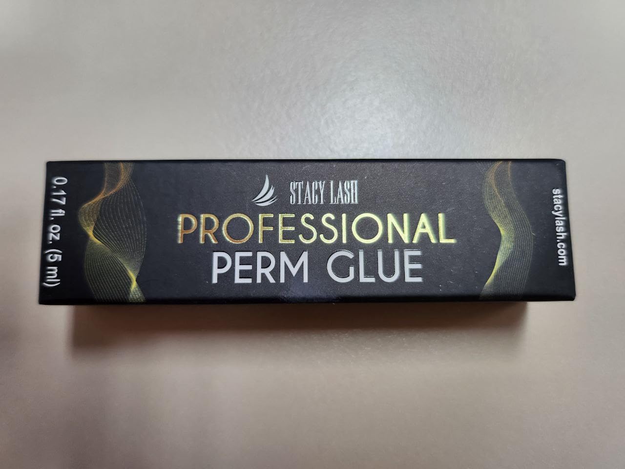 STACY LASH label and ingredient list highlighting keratin and D-biotin benefits