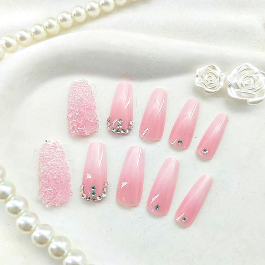 STADWWK close-up of rhinestone gradient detail highlighting decorative sparkle and glossy finish