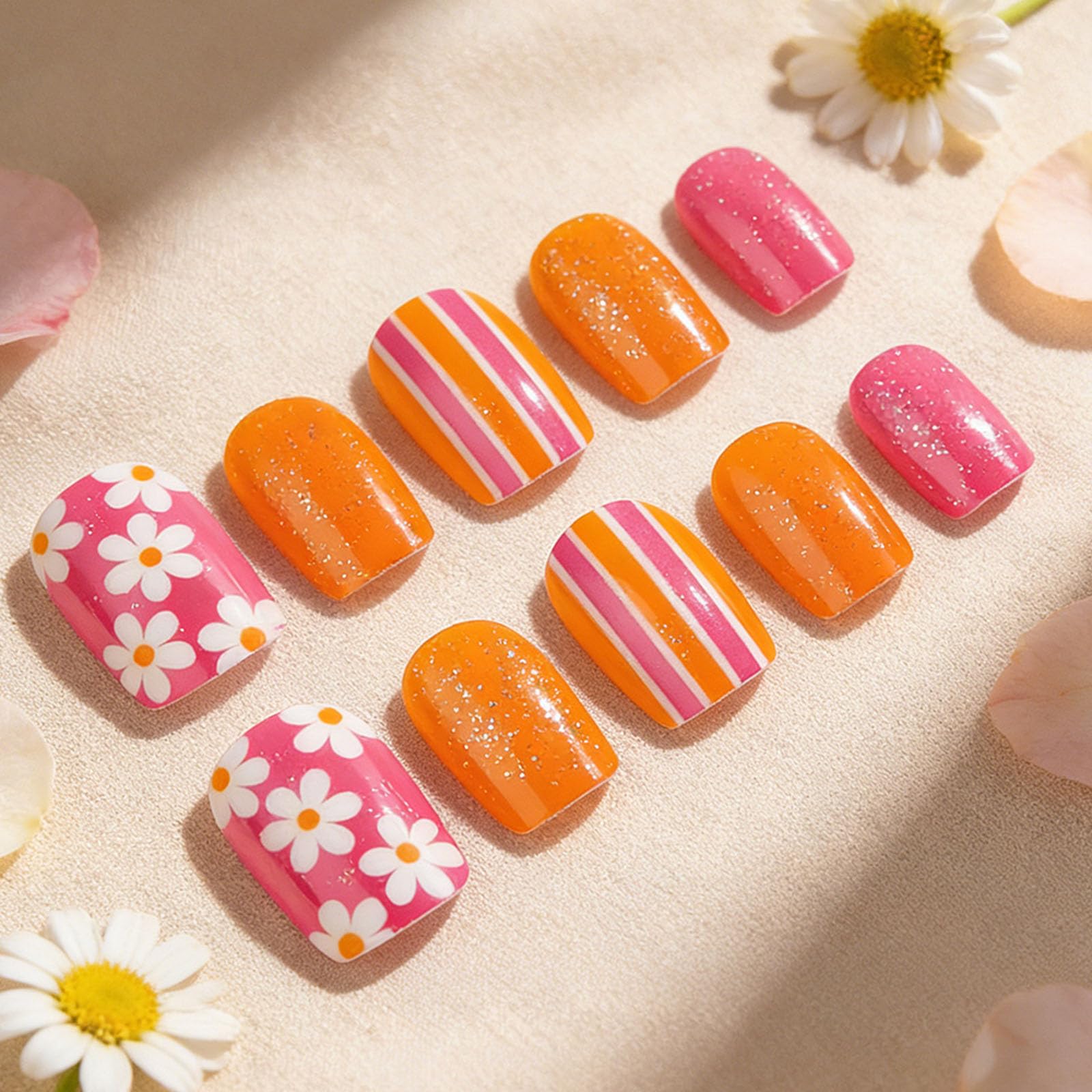 STADWWK nails on fingers to show size and short square shape for fit reference