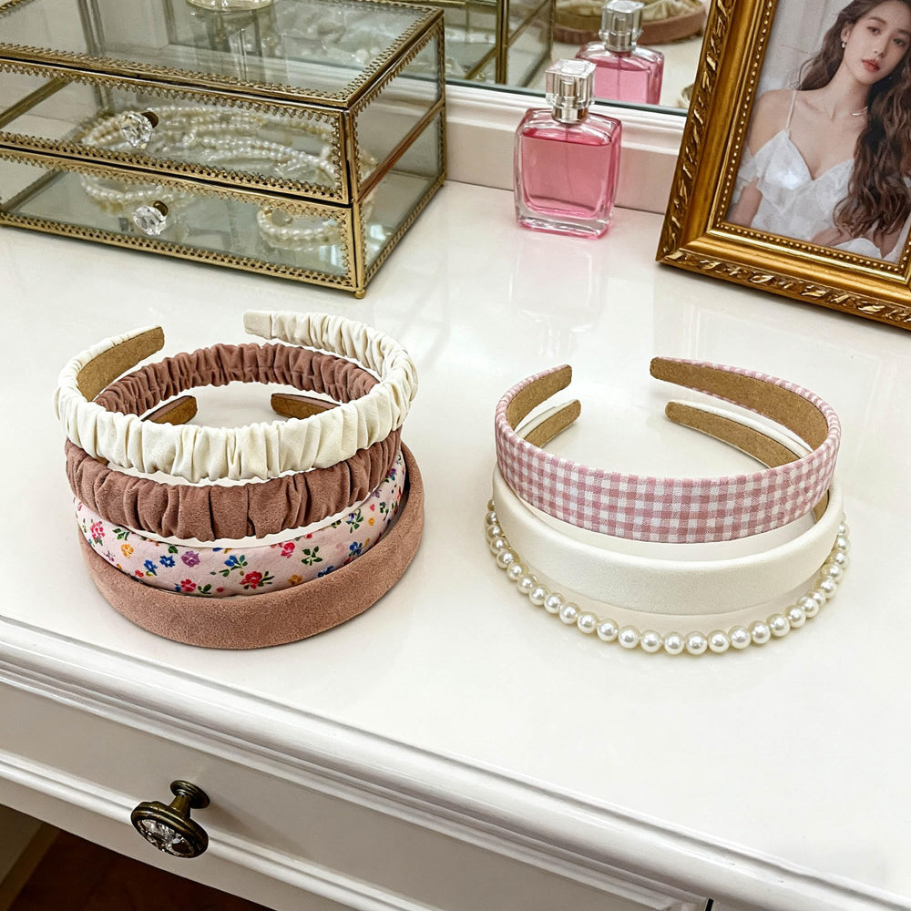 STANETCO assortment of thin and wide styles displayed flat