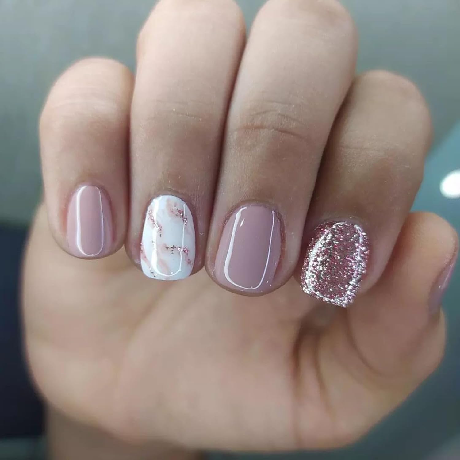 Stbisen front packaging showing dusty pink nude press-on nails, easy at-home manicure