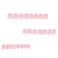 Stbisen nails in hand illustrating short square size and realistic fit