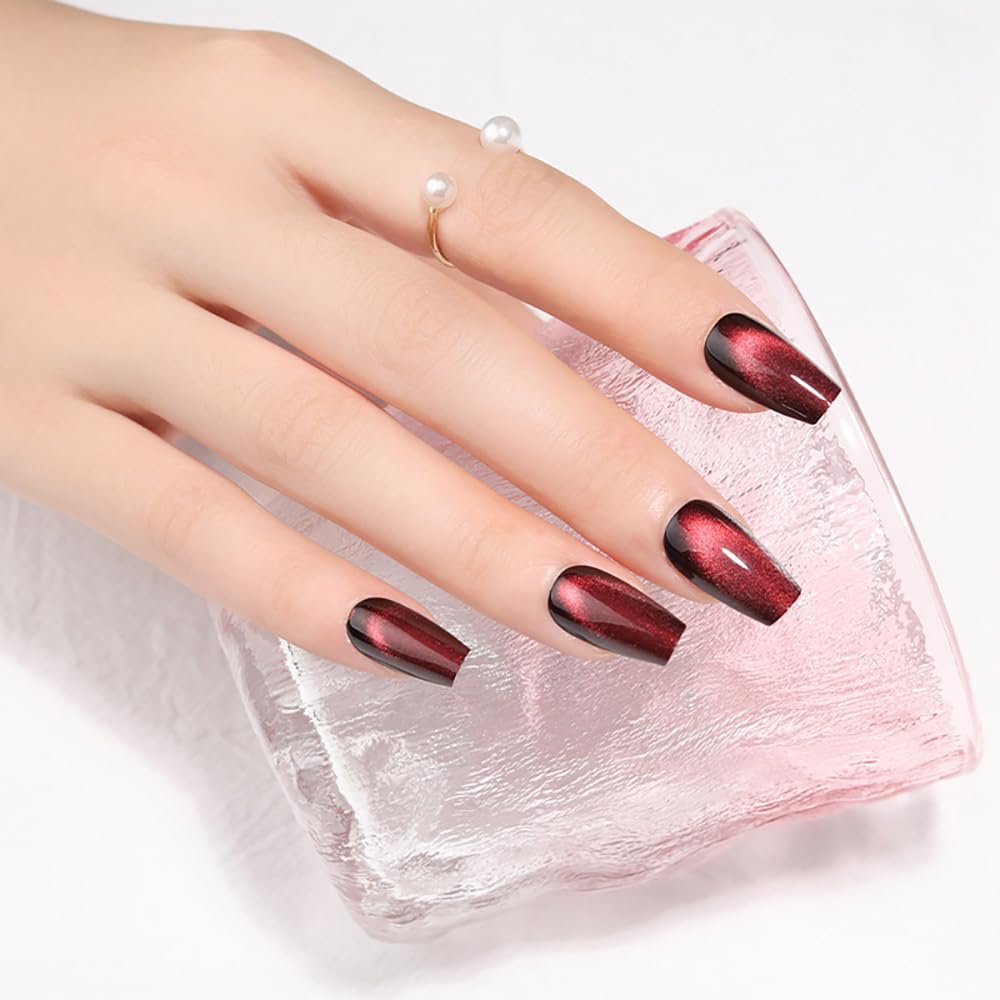 Stbisen closeup of cat eye pigment highlighting reflective burgundy depth and luxury
