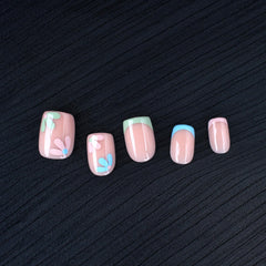 Stbisen arranged 30 press-on nails displaying sizes and blossom-pink designs