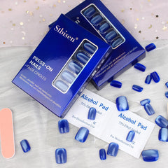 Stbisen nails in hand to show scale and comfortable short square benefit