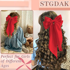 STGDAK bow next to hand for scale showing true oversized dimensions benefit