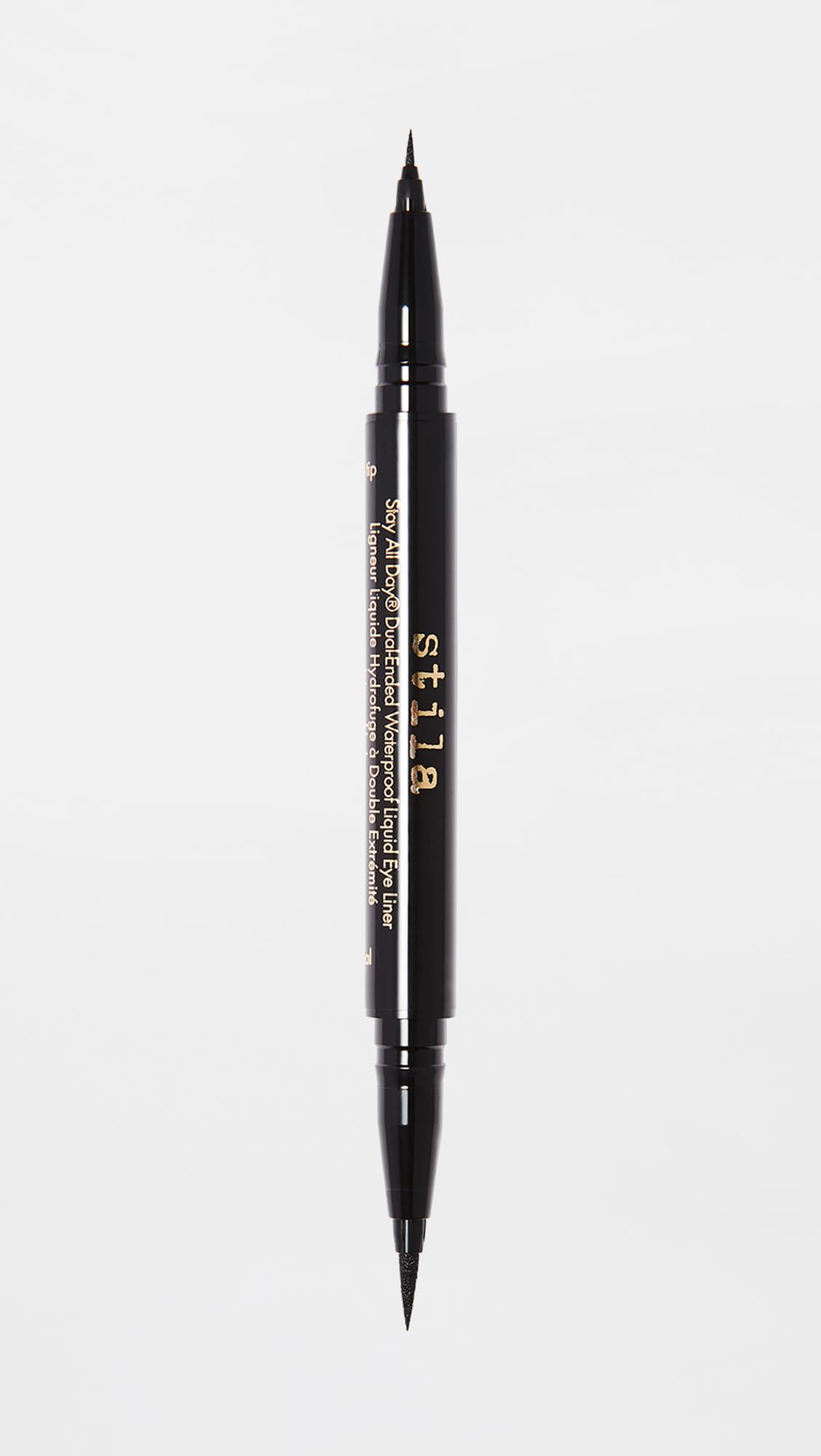 stila size comparison next to a makeup brush illustrating compact, portable size