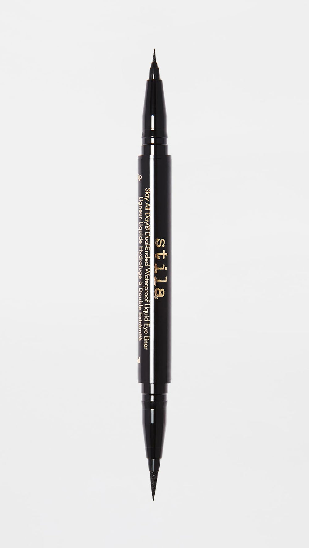 stila size comparison next to a makeup brush illustrating compact, portable size