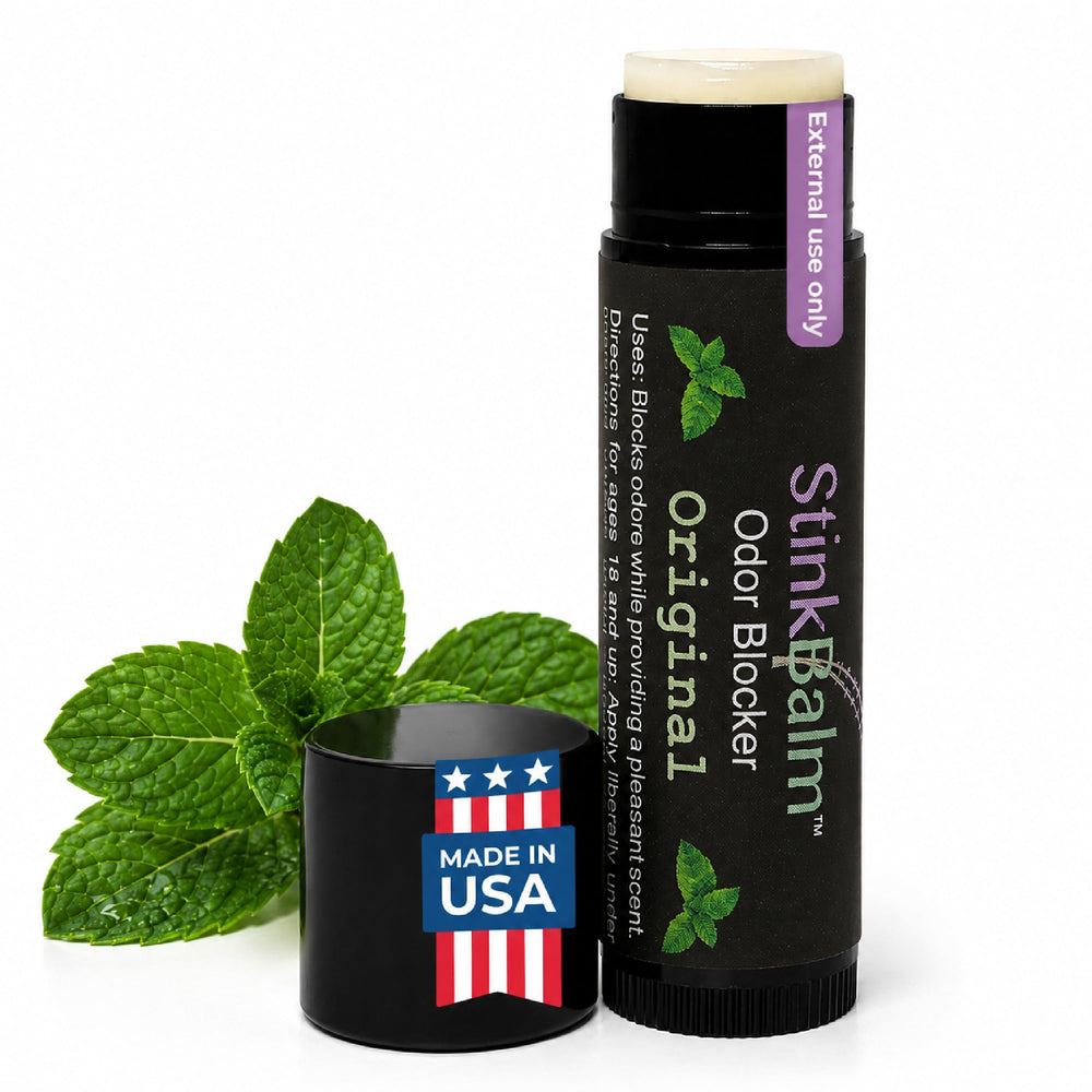 StinkBalm front tin showing compact packaging and portability benefit