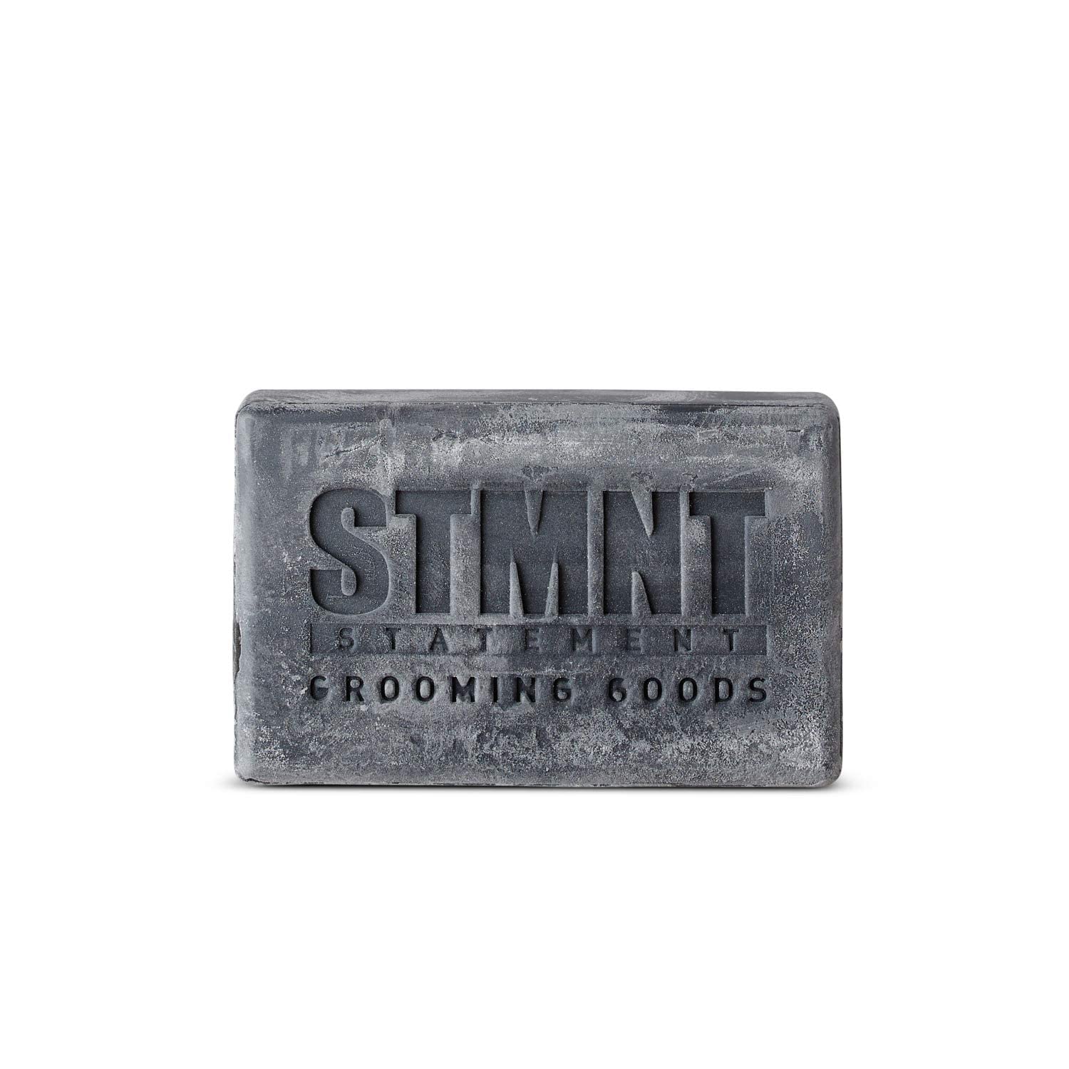 STMNT activated charcoal texture close-up highlighting purifying ingredients benefit