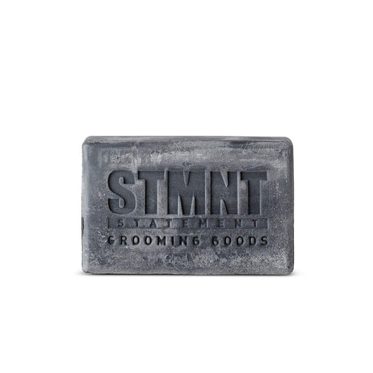 STMNT activated charcoal texture close-up highlighting purifying ingredients benefit