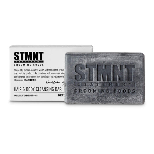 STMNT cleansing bar front packaging showing label and weight, travel-friendly benefit