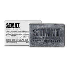 STMNT cleansing bar front packaging showing label and weight, travel-friendly benefit