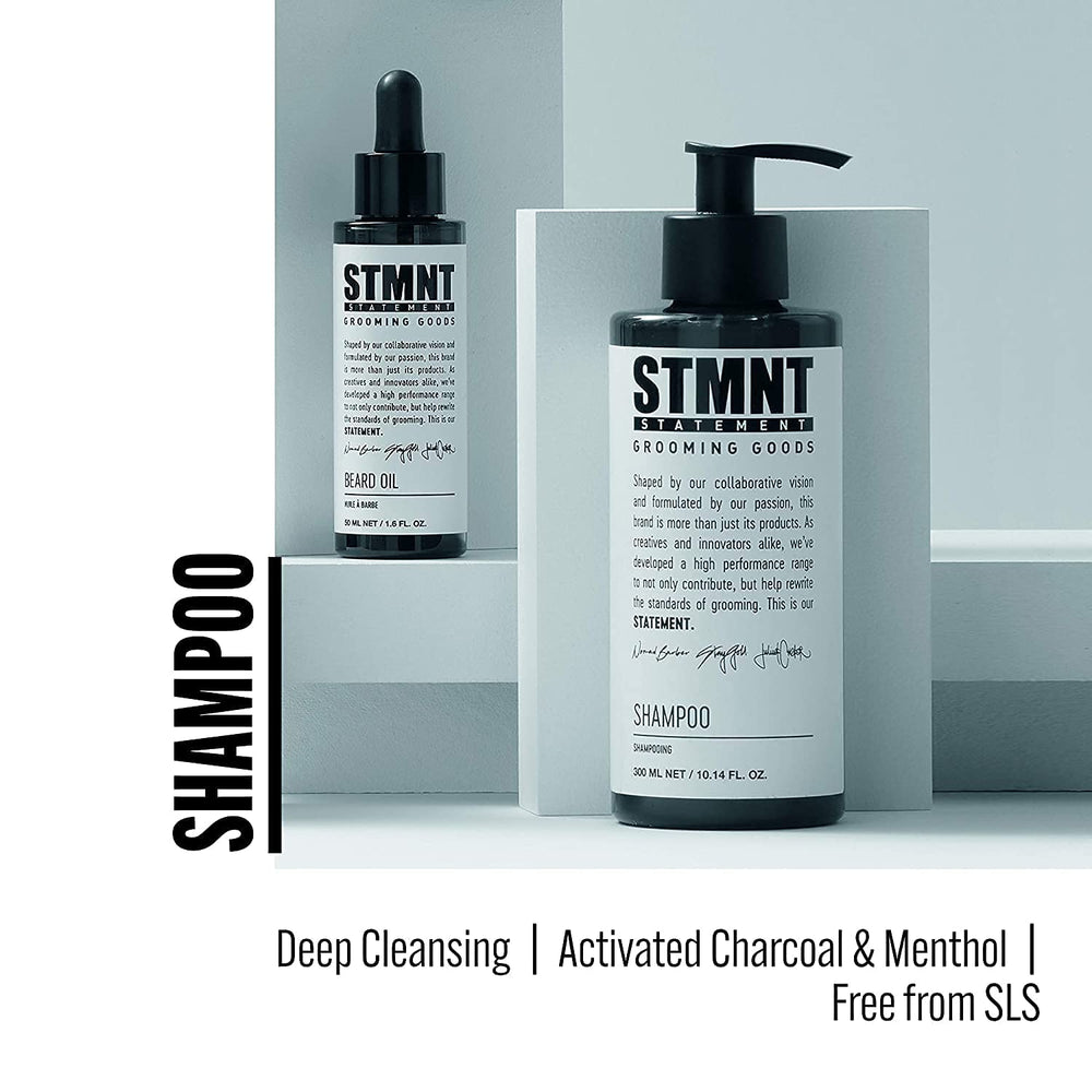 STMNT shampoo pump and label detail highlighting ingredients and clean formula benefit