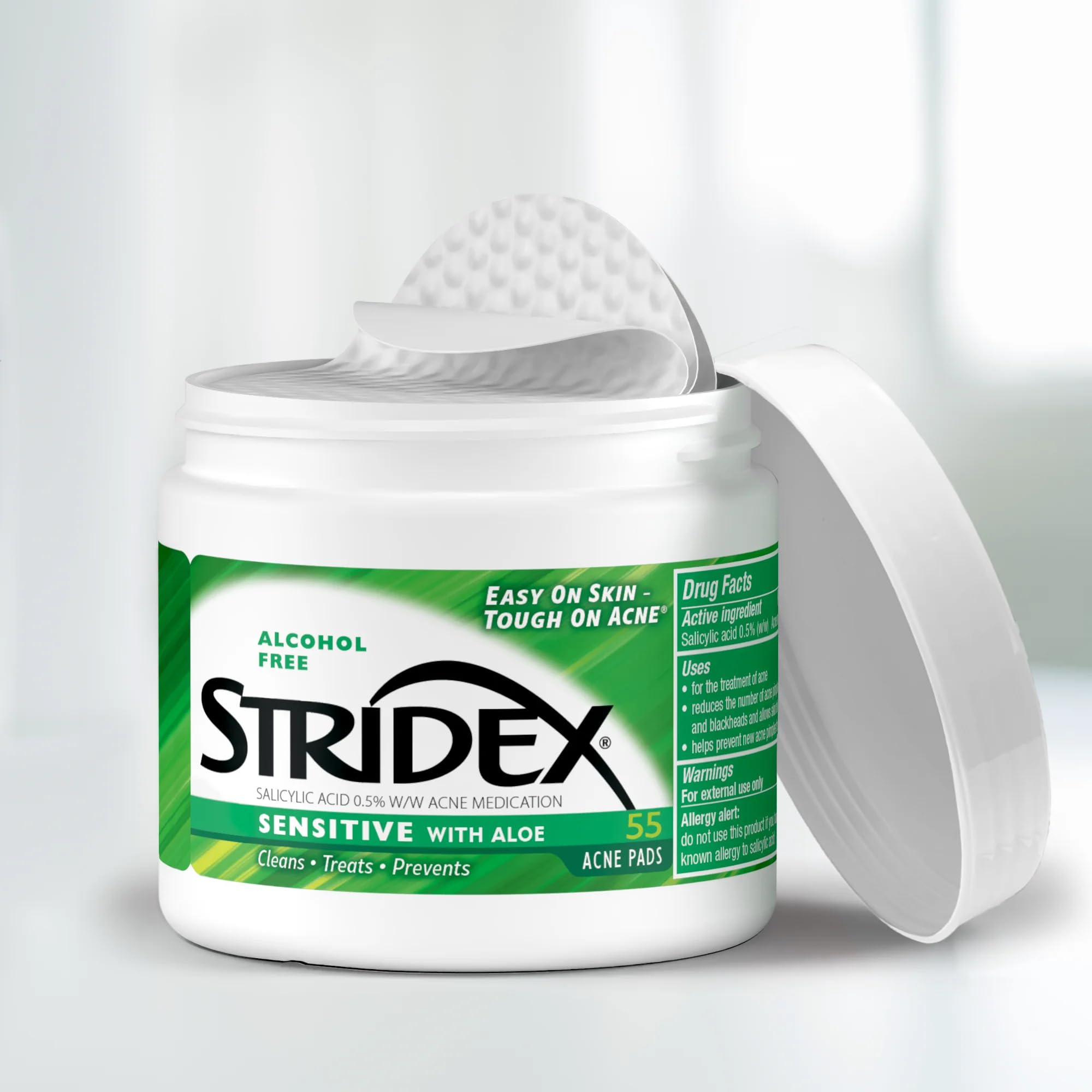 Single Stridex pad saturated with solution illustrating even product delivery and convenience