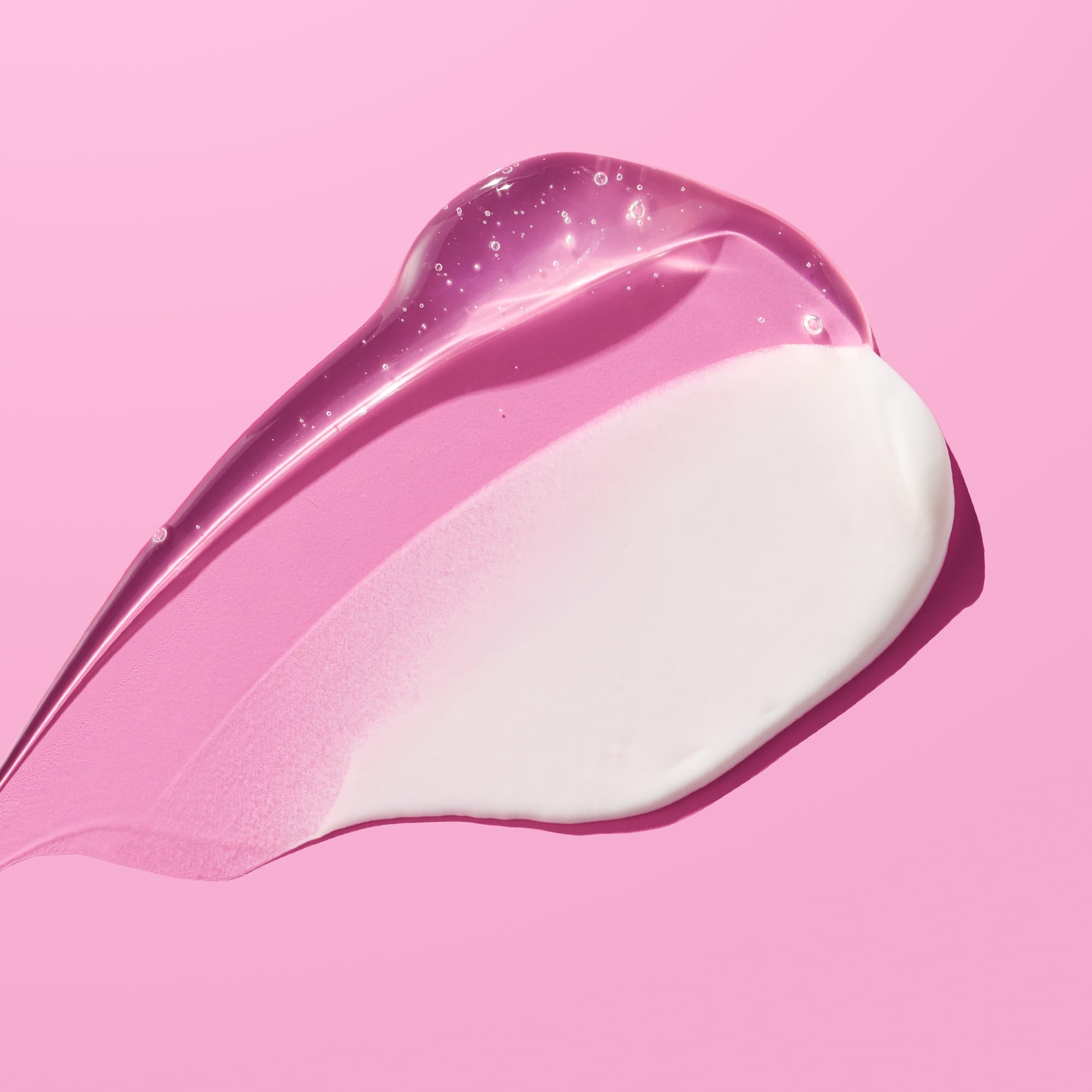 StriVectin bottle staged on bathroom counter, suggests daily routine use