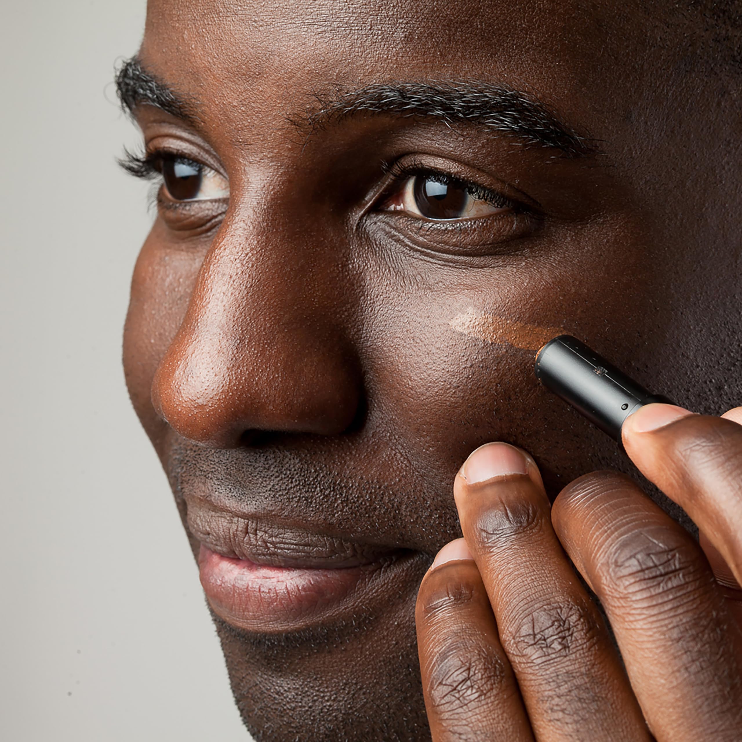 Stryx concealer on bathroom vanity showing everyday grooming convenience benefit