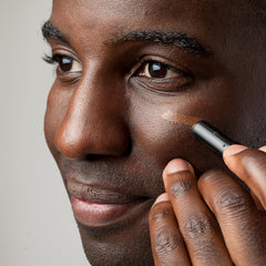 Stryx concealer on bathroom vanity showing everyday grooming convenience benefit