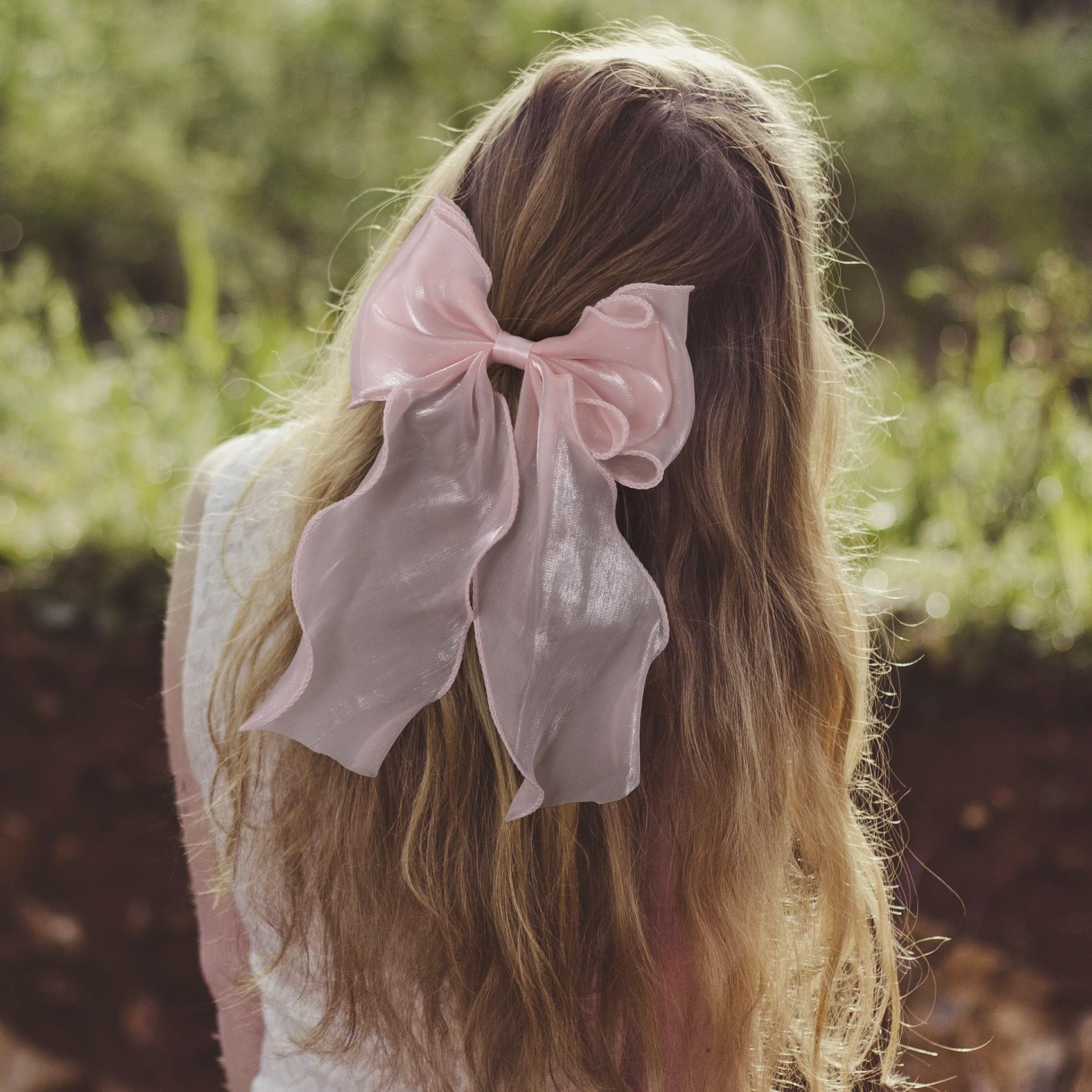 STSTR worn in ponytail demonstrating polished look and comfortable fit