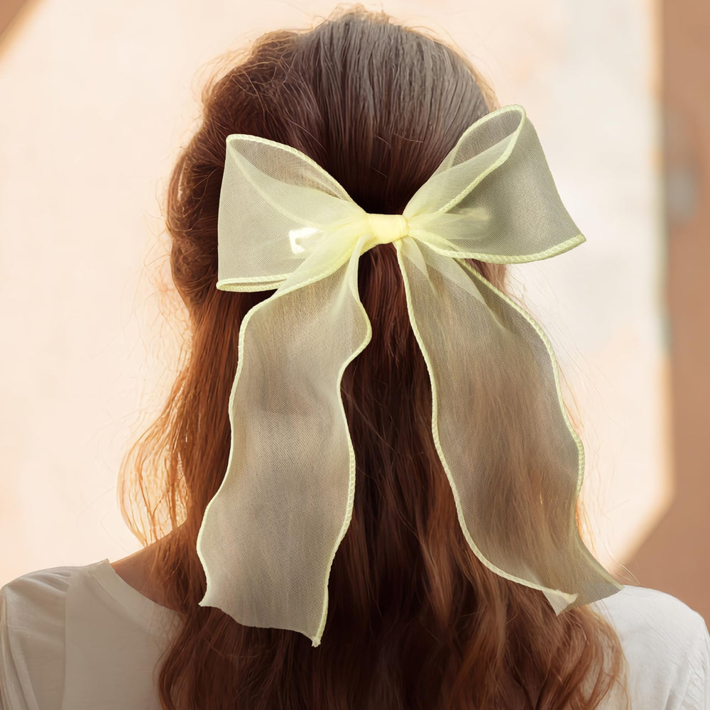 STSTR bow worn outdoors showing cheerful color benefit: bright seasonal accent