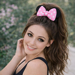 Styla Hair styled in a bun highlighting volume and secure hold