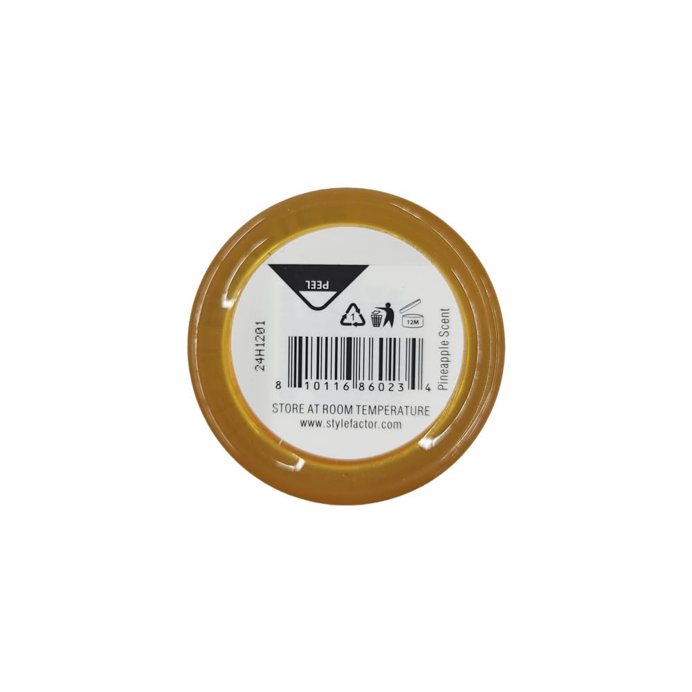 Style Factor EDGEBOOSTER on a counter with pineapple prop, fresh scent and travel ready