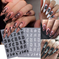 STZPRONAIL close-up of gold, black, white and silver Gothic letters highlighting crisp edges