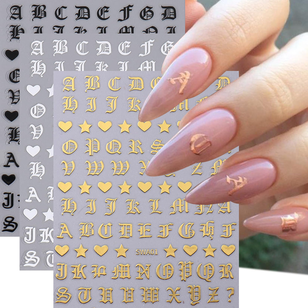 STZPRONAIL pressing a letter decal onto cured gel nail to ensure flat, durable adhesion