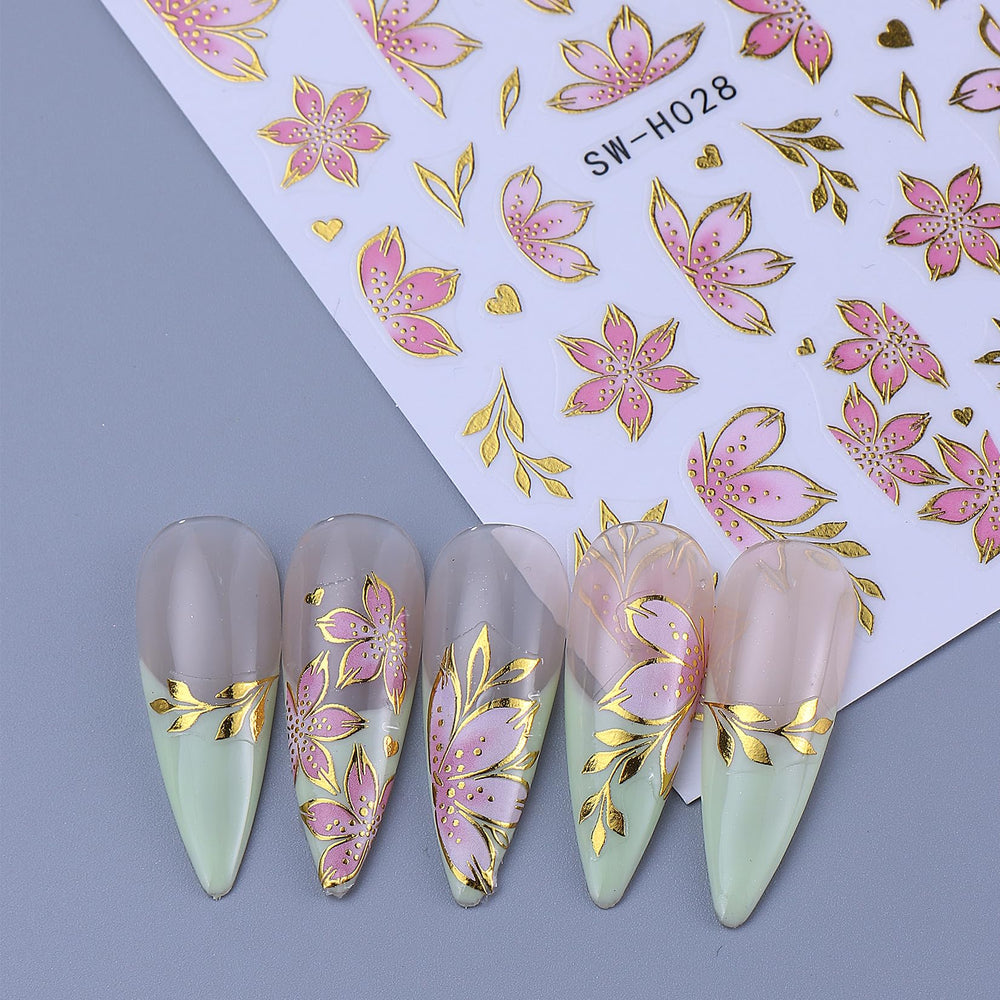 STZPRONAIL lifestyle image of summer manicure using floral decals for festive look