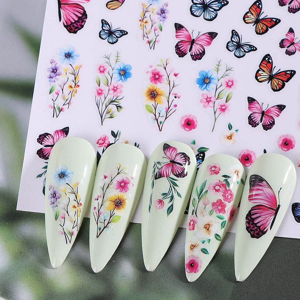 STZPRONAIL stickers on fingers showing size and scale for planning nail layouts benefit