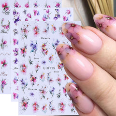 STZPRONAIL sheet next to a hand for scale showing true sticker size