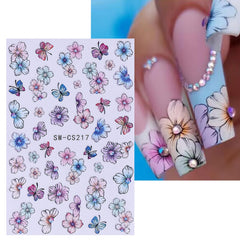 STZPRONAIL sticker on hand for scale showing sheet sizes and how they fit nail tips