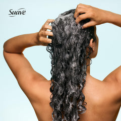 Suave bottle label close-up highlighting hyaluronic acid and aloe vera benefits