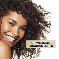 Diffused styled curls after Suave use showing bounce, definition and soft finish