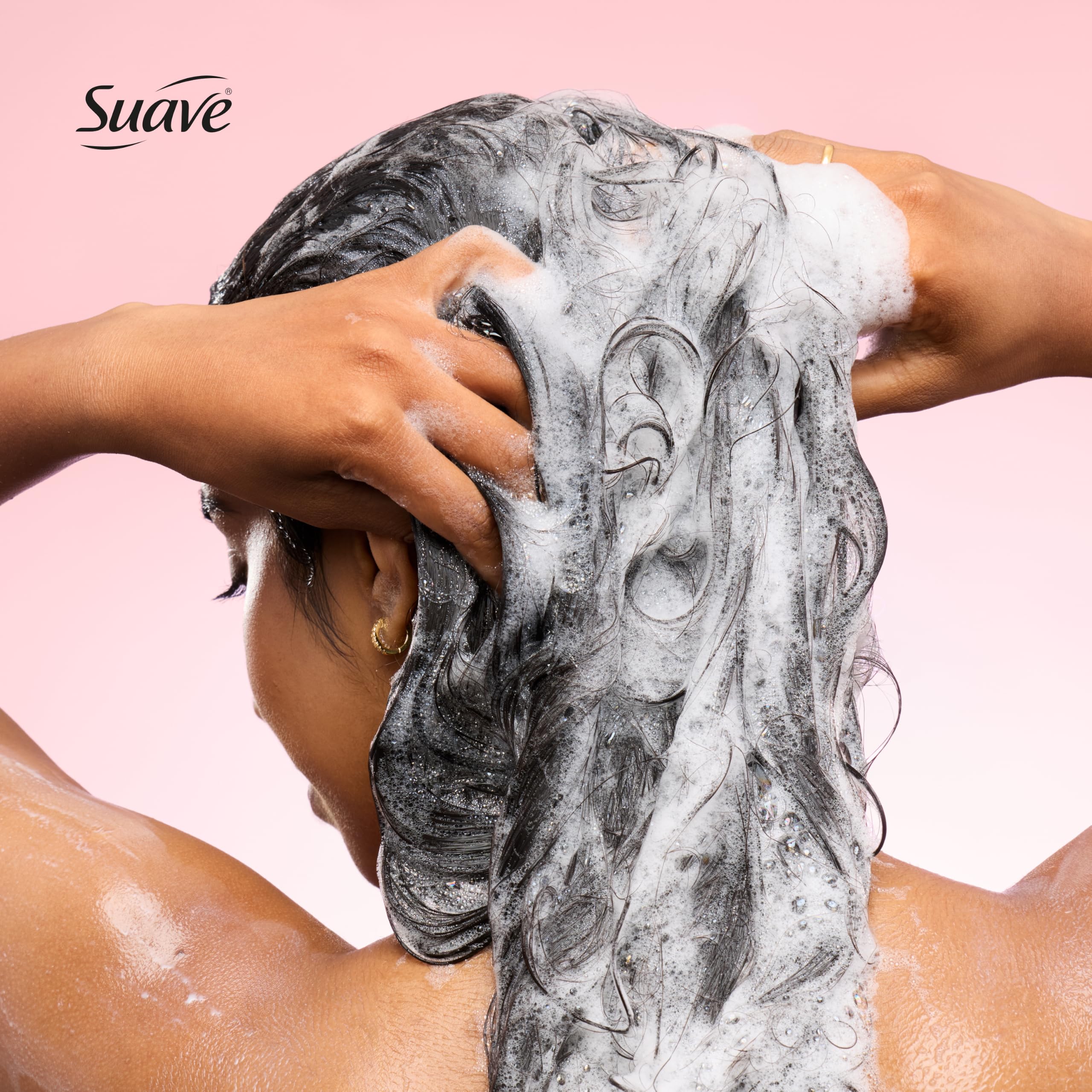 Suave conditioner cream close-up demonstrating smooth detangling benefit