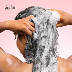 Suave conditioner cream close-up demonstrating smooth detangling benefit