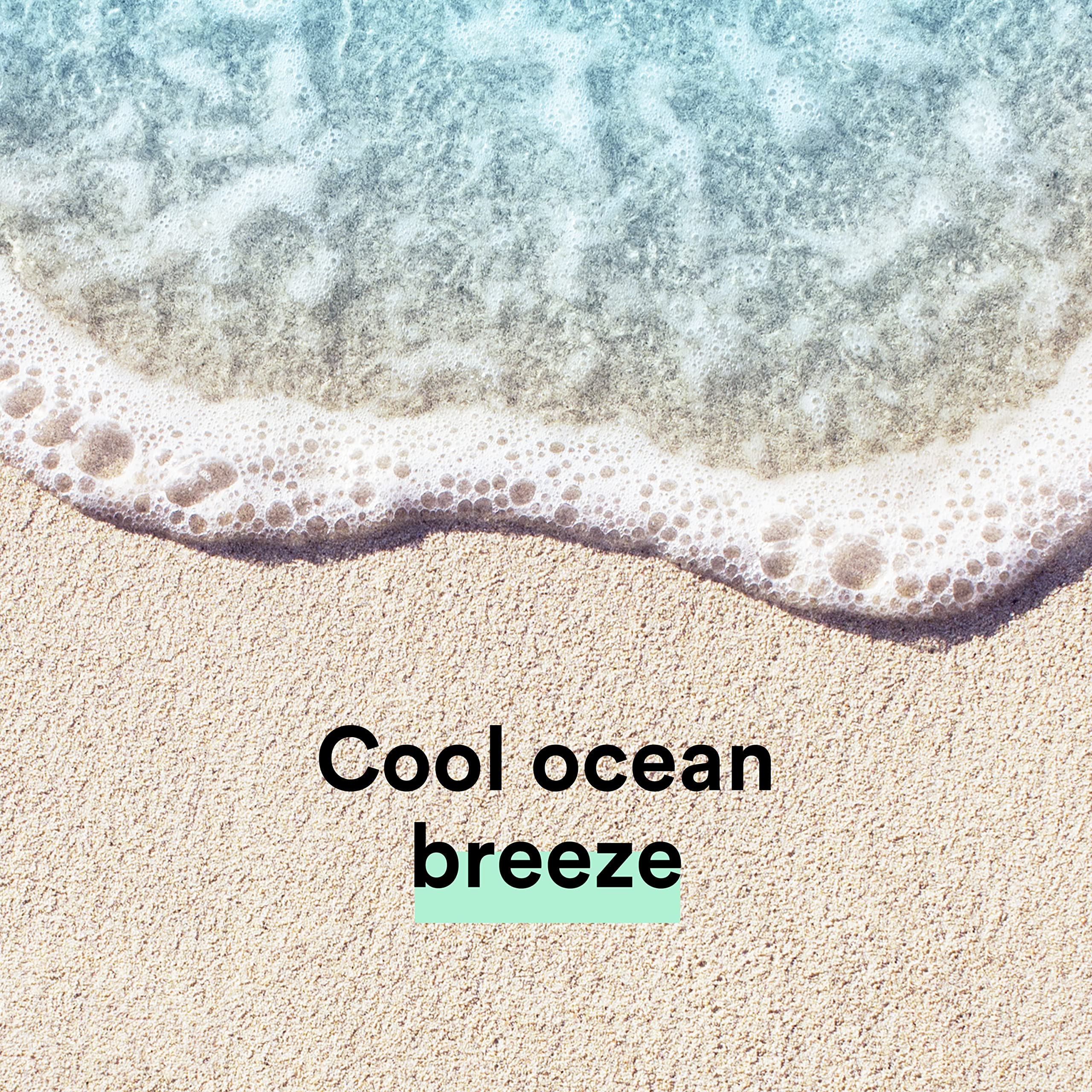 Pouring Suave Ocean Breeze in shower illustrating easy rinse and freshness