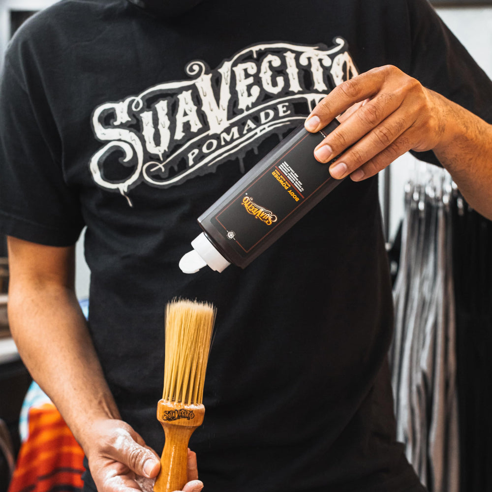 Suavecito label close-up with aloe vera highlighting soothing hydration