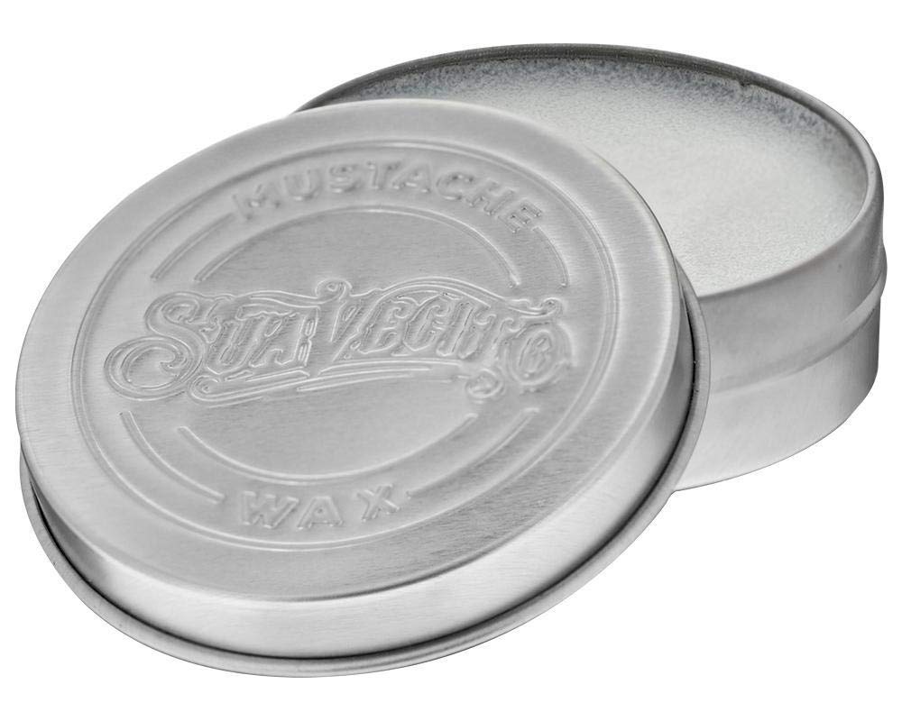 Applying Suavecito wax with fingers to demonstrate easy styling control