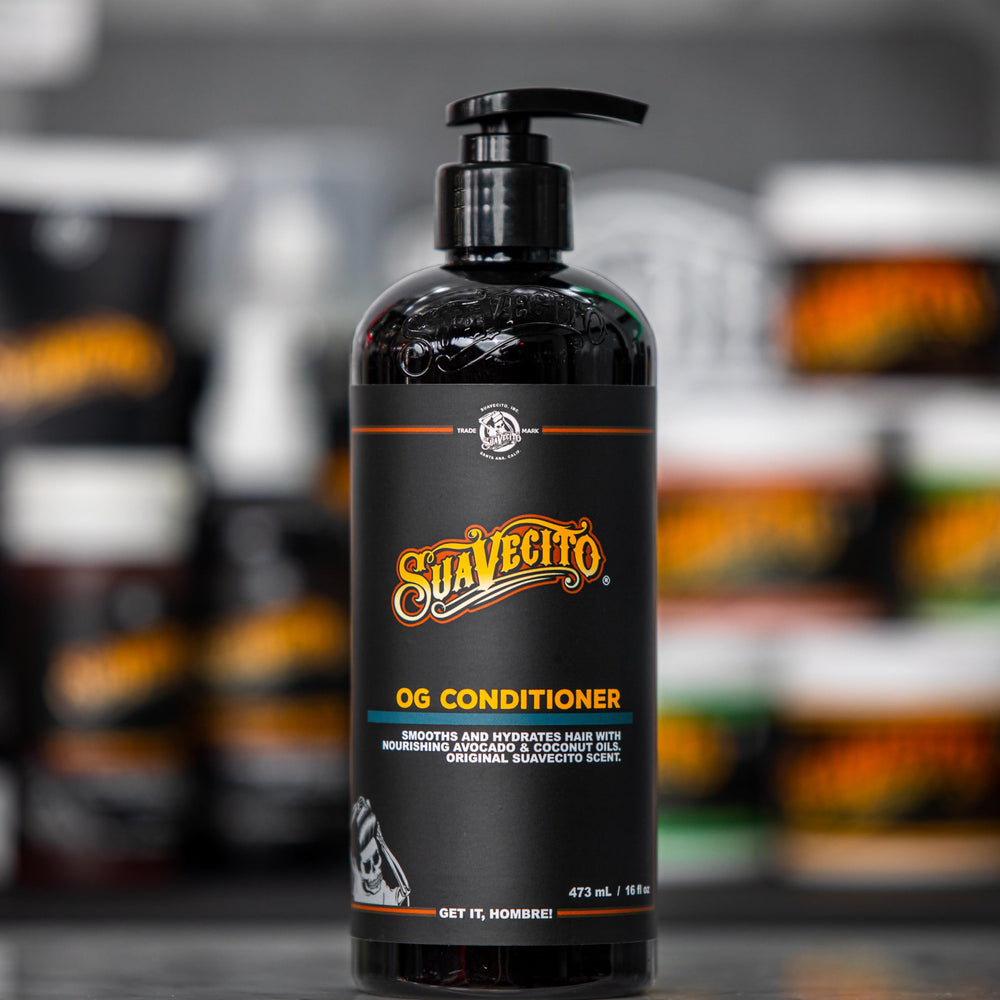 Suavecito beside ruler showing 16 oz bottle scale for value comparison