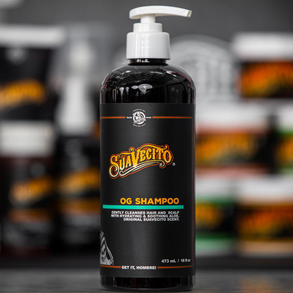 Suavecito OG shampoo in shower with water showing practical daily-use benefit