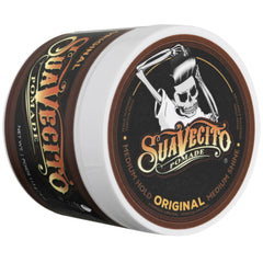 Suavecito jar beside ruler showing compact 4oz size for travel benefit