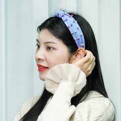 Sucrain headband styled with dress showing how pearls elevate an evening outfit benefit