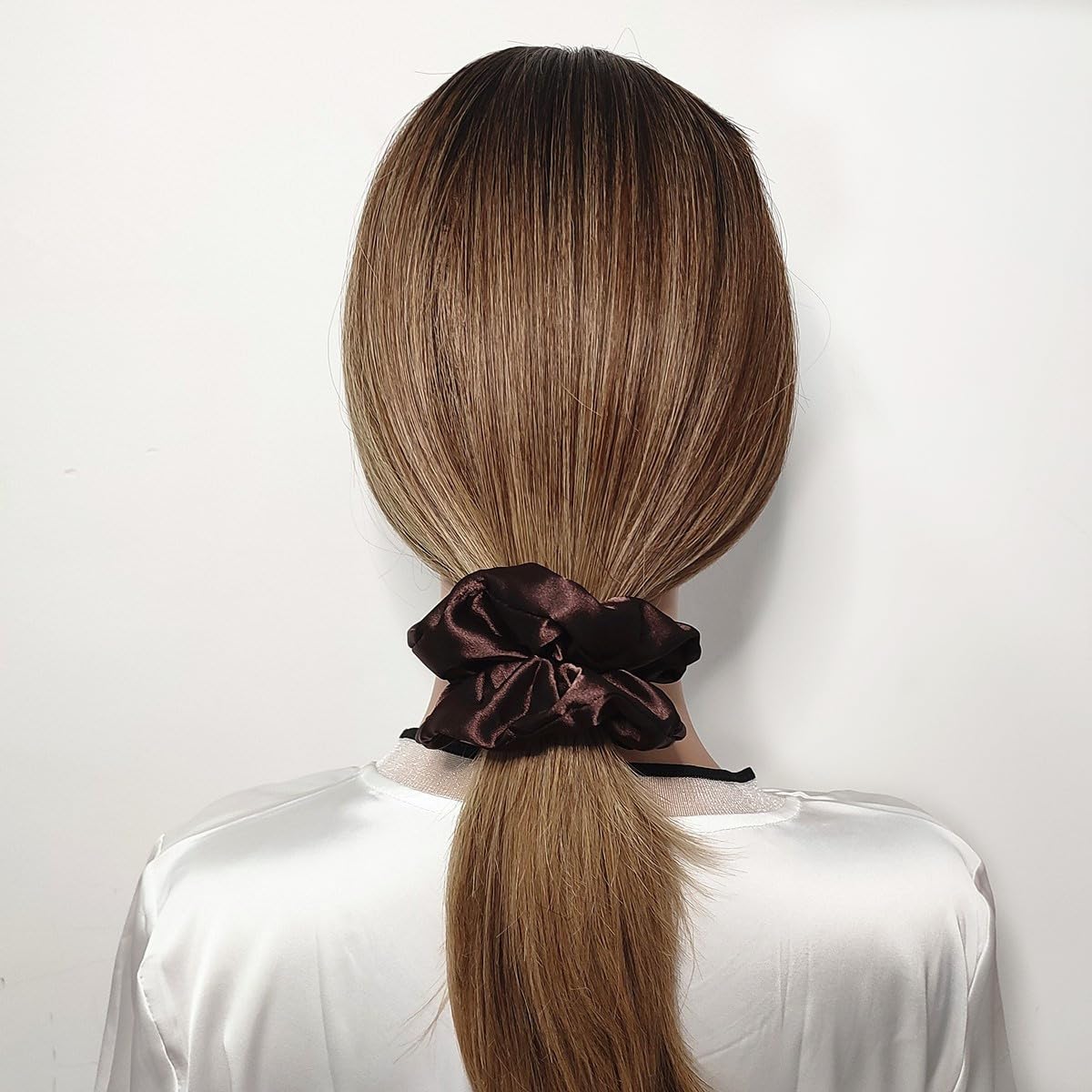 Sufermoe satin texture close-up highlighting smooth fabric and hair-friendly finish