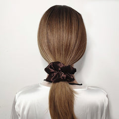 Sufermoe satin texture close-up highlighting smooth fabric and hair-friendly finish