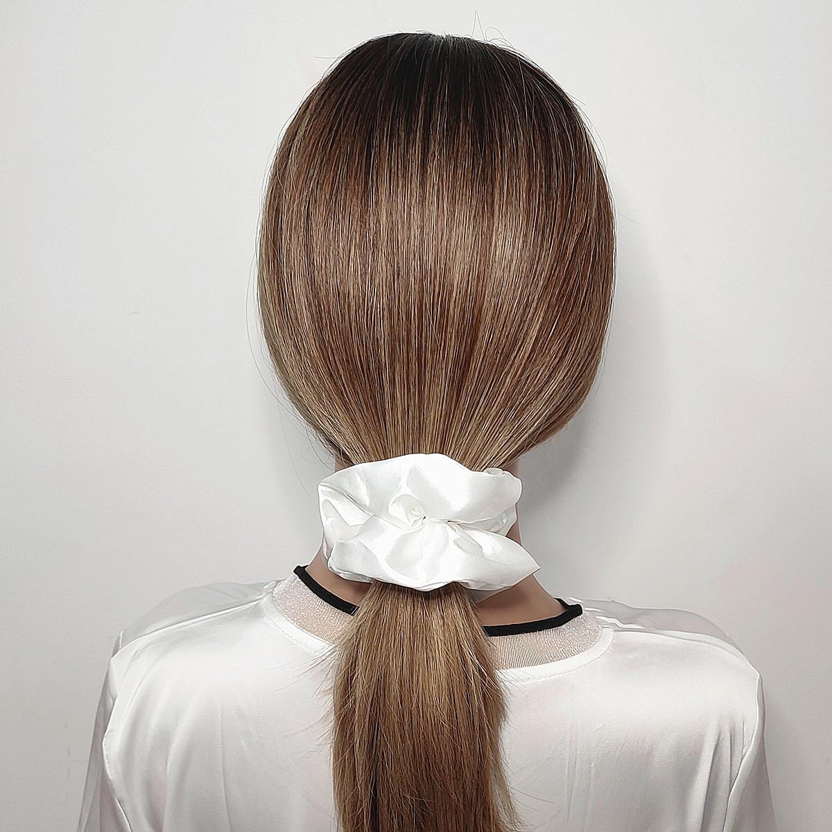 Sufermoe satin texture close-up highlighting smooth finish and gentle hair protection