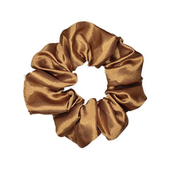 Sufermoe scrunchie in lifestyle setting complementing hair and wardrobe