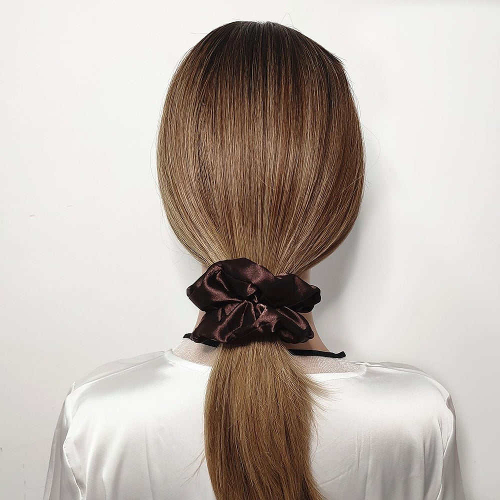 Sufermoe close-up satin texture highlighting smooth fabric that reduces hair friction and breakage