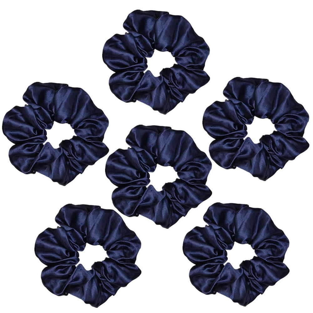 Sufermoe scrunchie on hand for scale showing 4.5 inch size and wearable bracelet option